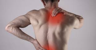 a man have a muscle pain in back pain.