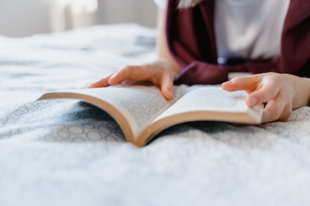 A student using the Cornell Method (page divided into sections).